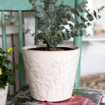 Cache-pot en céramique à relief